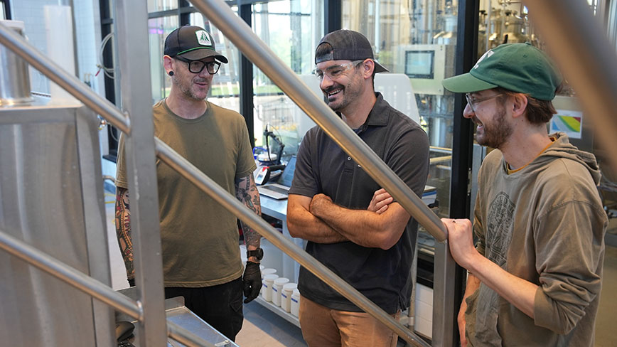 Brewers laugh and discuss brew day in Raht Technical Center Rahr Eagle Brewery