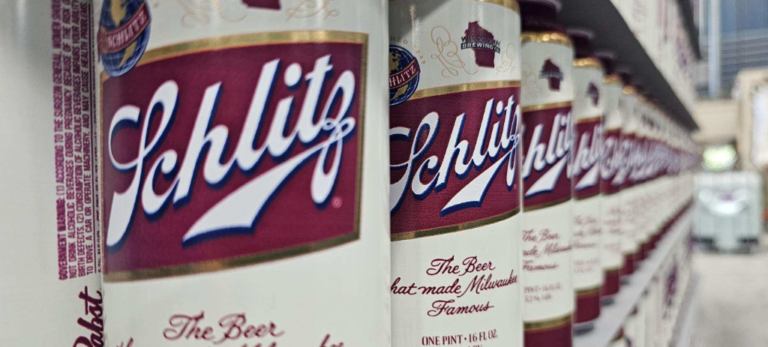 Schlitz cans lined up in long row