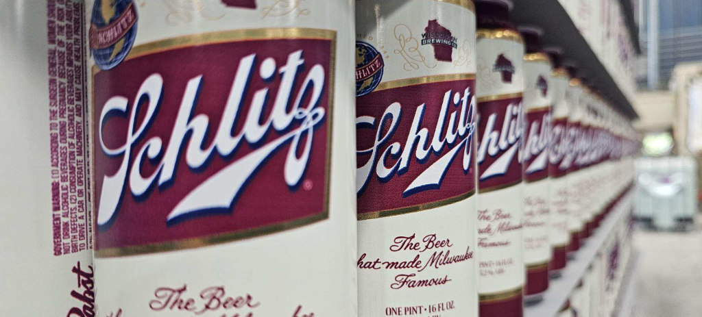 Schlitz cans lined up in long row
