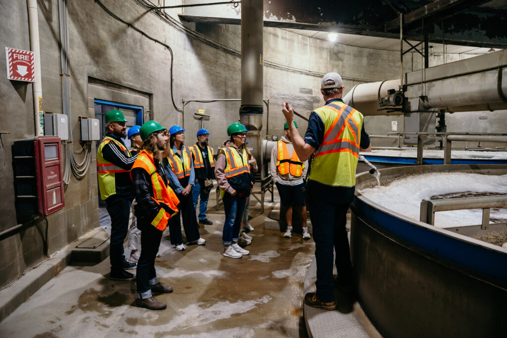 Brewers tour steeping room of Rahr Malting Company in Alberta, Canada.